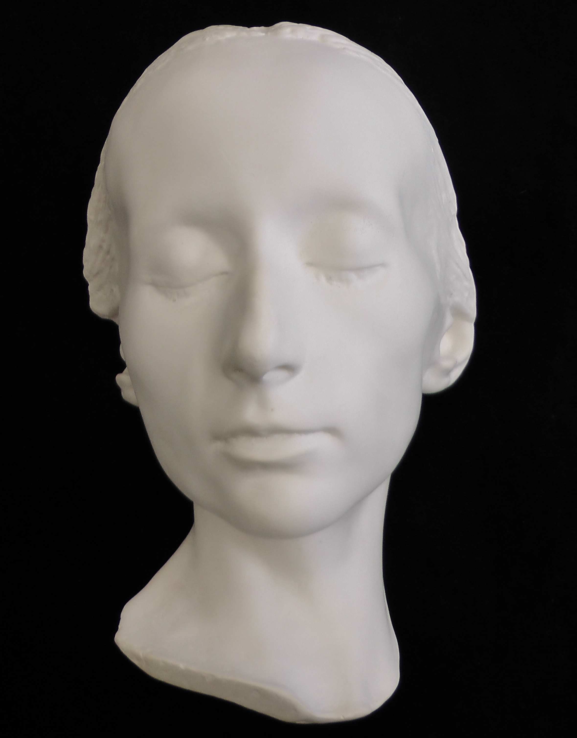 Odlitek hlavy neznámé ženy, o které panovaly domněnky, že se jedná o nedochovanou posmrtnou masku spisovatelky Boženy Němcové